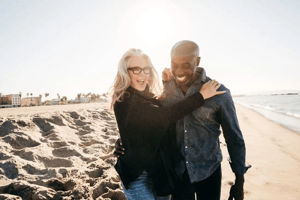 Man_Black_Woman_White_50s-60s_Hugging_Beach