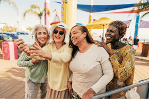 Women(4)_Multiethnic_50s-70s_TakingSelfie_AmusementPark_54-trim