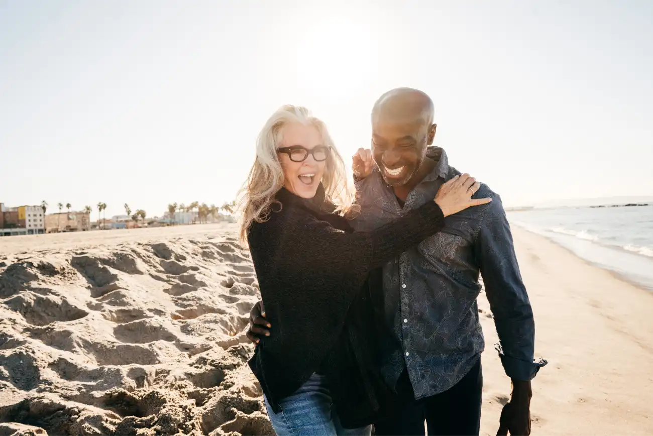 Man_Black_Woman_White_50s-60s_Hugging_Beach